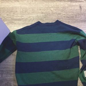 blue and green sweater